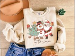vintage christmas sweatshirt featuring santa claus design for holiday celebrations and festive events tbfy6