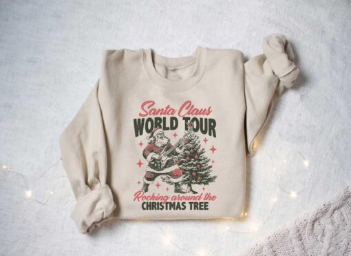 vintage christmas sweatshirt featuring santa claus rocking around the tree retro design comfortable hoodie for holiday celebrations am0hh