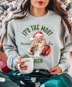 vintage christmas sweatshirt featuring santa drinking beer funny retro design for holiday parties and gatherings hp0bz