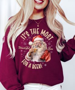 vintage christmas sweatshirt featuring santa drinking beer funny retro design for holiday parties and gatherings oe0sz