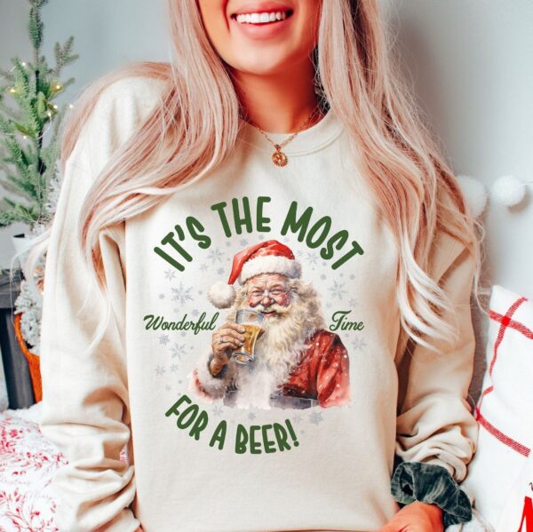 vintage christmas sweatshirt featuring santa drinking beer funny retro design for holiday parties and gatherings