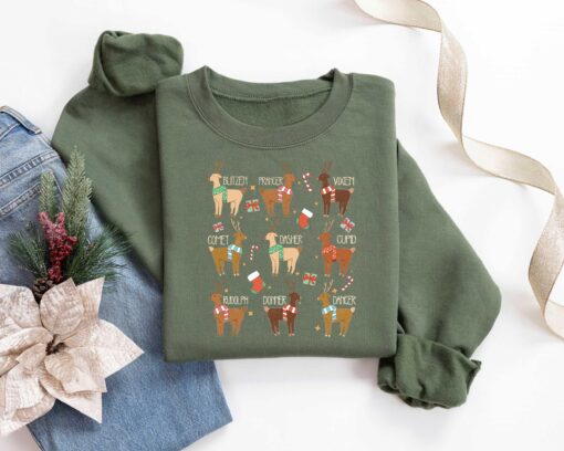 vintage christmas sweatshirt featuring santas reindeer names for kids funny holiday tee with unique design