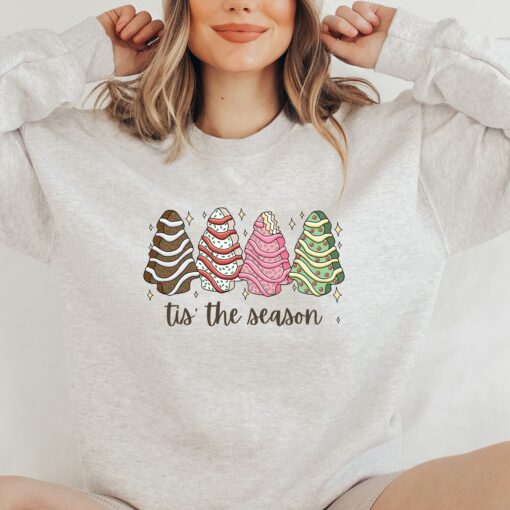 vintage christmas sweatshirt featuring tis the season tree cakes design for unique holiday style and comfort s9dgr scaled