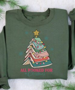 vintage christmas sweatshirt for book lovers featuring a book tree design ideal for holiday gatherings and teacher appreciation s369y scaled