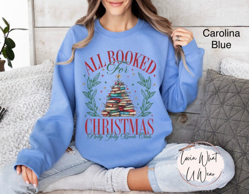 vintage christmas sweatshirt for book lovers featuring a books christmas tree design comfortable oversized holiday apparel uosll