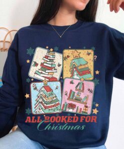 vintage christmas sweatshirt for book lovers featuring a christmas book tree design ideal for librarians and bookworms bzlyq