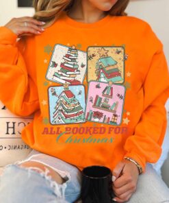 vintage christmas sweatshirt for book lovers featuring a christmas book tree design ideal for librarians and bookworms dltq9