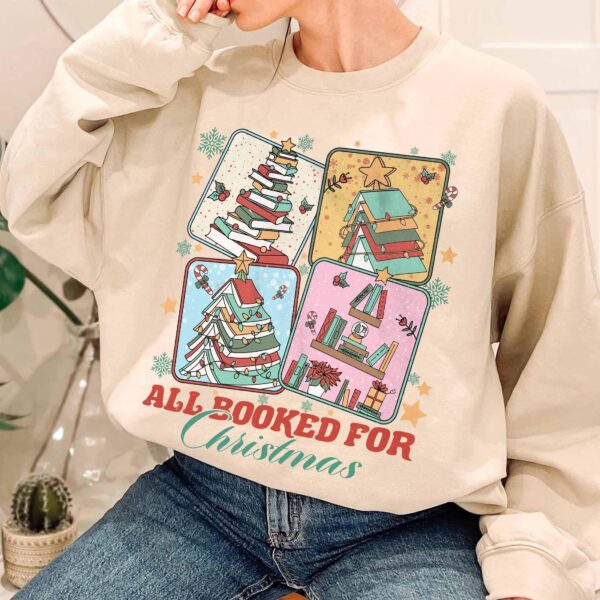 vintage christmas sweatshirt for book lovers featuring a christmas book tree design ideal for librarians and bookworms osclw