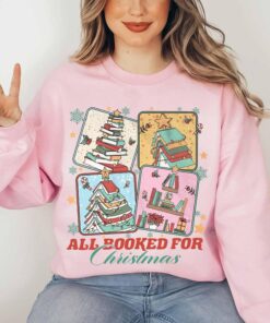 vintage christmas sweatshirt for book lovers featuring a christmas book tree design ideal for librarians and bookworms ziwob