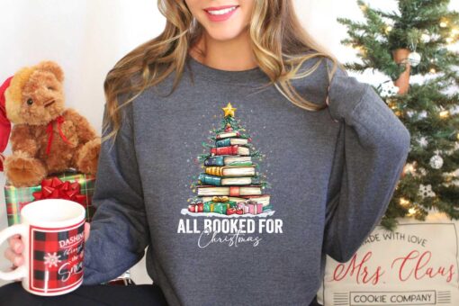 vintage christmas sweatshirt for book lovers featuring book tree design and ideal for holiday gatherings or teacher appreciation