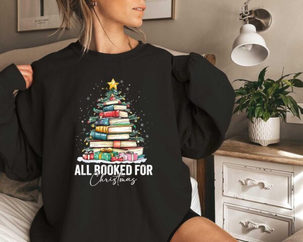 vintage christmas sweatshirt for book lovers featuring book tree design and ideal for holiday gatherings or teacher appreciation