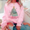 vintage christmas sweatshirt for book lovers featuring books and christmas tree design perfect for holiday gatherings a0uuo