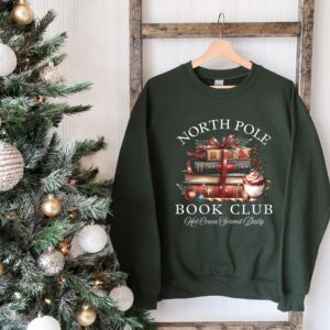 vintage christmas sweatshirt for book lovers featuring north pole book club design and retro santa graphic for holiday celebrations 44bc0