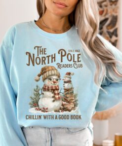 vintage christmas sweatshirt for book lovers featuring north pole book club snowman design and comfortable fit 0i14e scaled