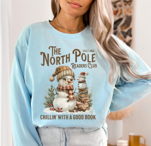 vintage christmas sweatshirt for book lovers featuring north pole book club snowman design and comfortable fit 0i14e scaled