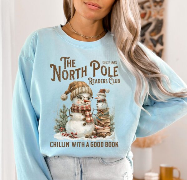 vintage christmas sweatshirt for book lovers featuring north pole book club snowman design and comfortable fit 0i14e scaled