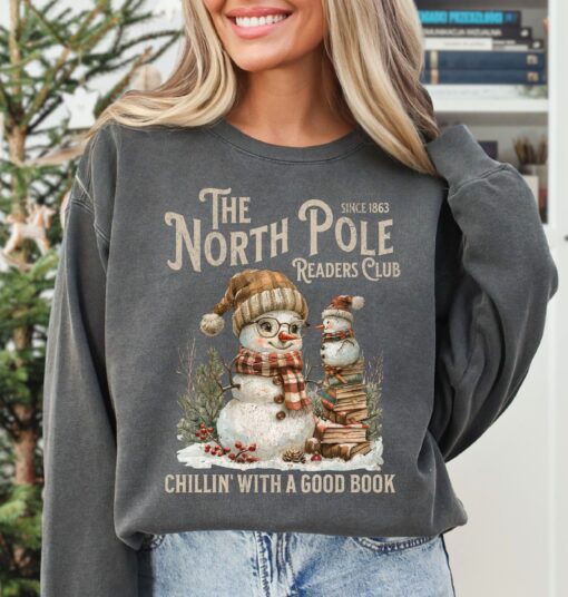 vintage christmas sweatshirt for book lovers featuring north pole book club snowman design and comfortable fit a11jw scaled