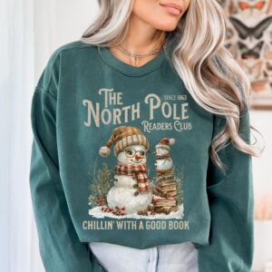 vintage christmas sweatshirt for book lovers featuring north pole book club snowman design and comfortable fit wmivn