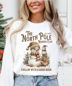 vintage christmas sweatshirt for book lovers featuring north pole book club snowman design and comfortable fit wxpku scaled