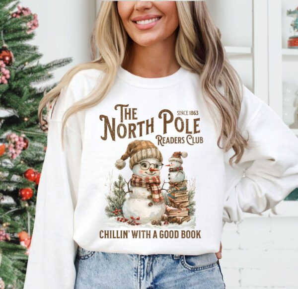 vintage christmas sweatshirt for book lovers featuring north pole book club snowman design and comfortable fit wxpku scaled