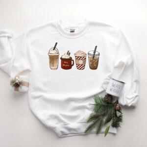 vintage christmas sweatshirt for coffee lovers featuring snowman and latte design ideal for winter wear hhy1g