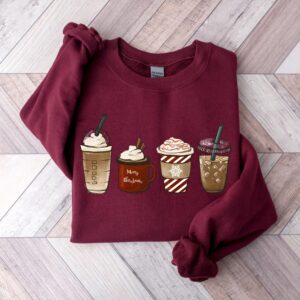 vintage christmas sweatshirt for coffee lovers featuring snowman and latte design ideal for winter wear uv5kl