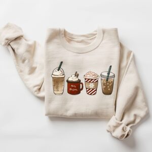 vintage christmas sweatshirt for coffee lovers featuring snowman design and winter latte theme ag9cm