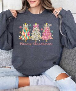 vintage christmas sweatshirt for girls with christmas tree design and bow detail in brushstroke style o2xke