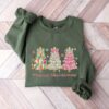 vintage christmas sweatshirt for girls with christmas tree design and bow detail in brushstroke style wsuow