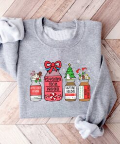 vintage christmas sweatshirt for healthcare workers featuring snowman design ideal for pharmacists and pharmacy technicians 7klpn scaled