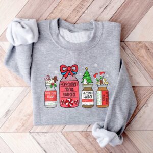 vintage christmas sweatshirt for healthcare workers featuring snowman design ideal for pharmacists and pharmacy technicians 7klpn scaled