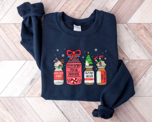 vintage christmas sweatshirt for healthcare workers featuring snowman design ideal for pharmacists and pharmacy technicians botfe scaled