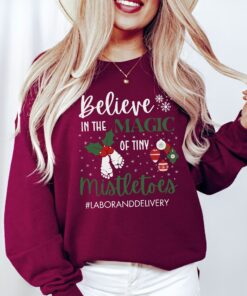 vintage christmas sweatshirt for labor and delivery nurses funny mistletoe design for nicu and obgyn professionals rmdxk