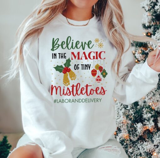 vintage christmas sweatshirt for labor and delivery nurses funny mistletoe design for nicu and obgyn professionals wojdo