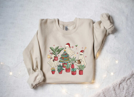 vintage christmas sweatshirt for plant lovers featuring cute ghost design and tree graphics 0f3ph scaled