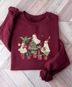 vintage christmas sweatshirt for plant lovers featuring cute ghost design and tree graphics kwpvd scaled