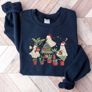 vintage christmas sweatshirt for plant lovers featuring cute ghost design and tree graphics trxob scaled