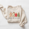 vintage christmas sweatshirt for pregnancy announcement with cute cookie design and maternity fit perfect for holiday reveals 5cgmi