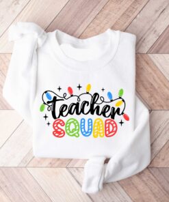 vintage christmas sweatshirt for teachers with fun holiday lights design for school parties and winter celebrations dqdit scaled