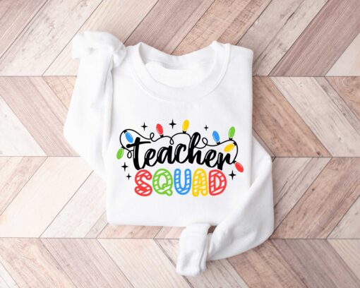 vintage christmas sweatshirt for teachers with fun holiday lights design for school parties and winter celebrations dqdit scaled