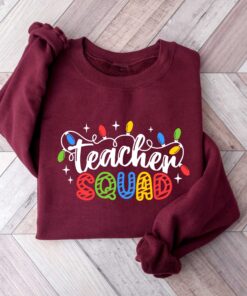 vintage christmas sweatshirt for teachers with fun holiday lights design for school parties and winter celebrations kw7lh scaled