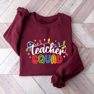 vintage christmas sweatshirt for teachers with fun holiday lights design for school parties and winter celebrations kw7lh scaled