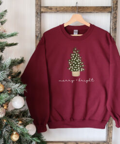 vintage christmas sweatshirt for women featuring a festive tree design in a comfortable crewneck style for winter wear x4vis scaled