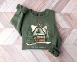 vintage christmas sweatshirt for women featuring a fun christmas house design and cookie print for holiday celebrations iw3ip