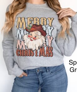 vintage christmas sweatshirt for women featuring cowboy santa design with western style and retro holiday theme dn705