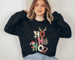 vintage christmas sweatshirt for women featuring ho ho ho design retro crewneck style trendy xmas apparel btx1q