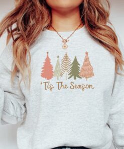 vintage christmas sweatshirt for women featuring holiday design and comfortable fit ideal for festive celebrations and seasonal wear lvuwl