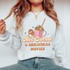 vintage christmas sweatshirt for women featuring hot cocoa and movies design comfortable crewneck style for holiday celebrations 4xwnv