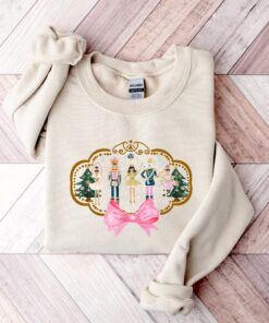 vintage christmas sweatshirt for women featuring pink nutcracker design comfortable and stylish long sleeve shirt for holiday wear ypdt0