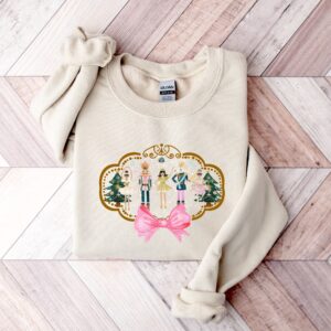 vintage christmas sweatshirt for women featuring pink nutcracker design comfortable and stylish long sleeve shirt for holiday wear ypdt0